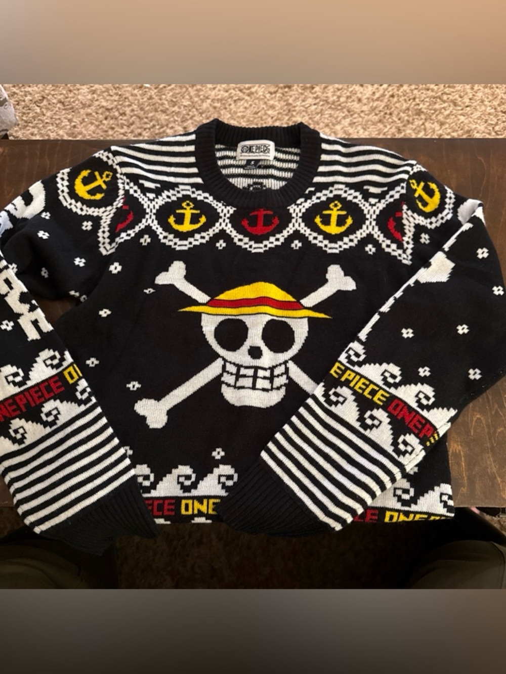 Onepiece Black Crewneck Sweater with Yellow & Red Accents